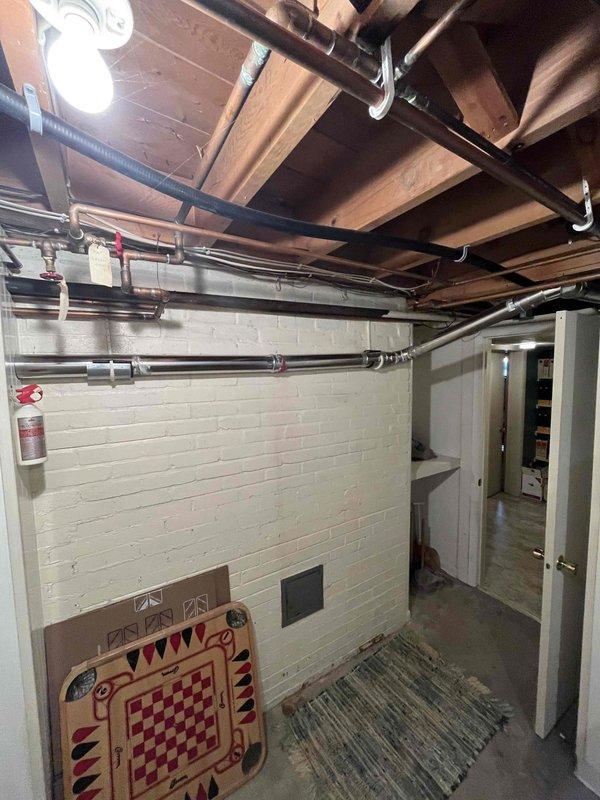 Responded to service call for boiler leak affecting exhaust system and relief valve. Identified leaking exhaust piping allowing combustion gases to enter living space and confirmed relief valve failure. Replaced defective relief valve and sealed leaking exhaust pipe connections with high-temperature RTV sealant to restore safe operation and prevent further gas infiltration into the home.