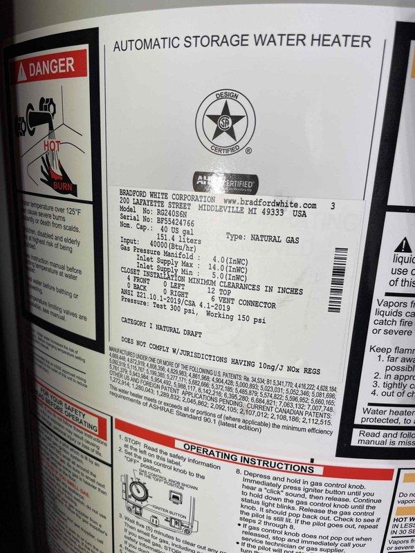 Installed a 40-gallon Bradford White natural gas atmospheric vent water heater in basement location. Installed new shutoff valve on cold water supply line and connected copper water piping to unit inlet and outlet connections. Connected water heater flue to existing natural draft vent system and utilized existing gas shutoff valve to connect gas piping to the appliance. All connections were tested and verified operational upon completion.