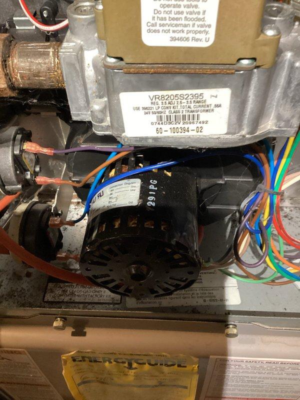 Completed annual maintenance on furnace over 10 years old. Identified leaking gas valve model VR8205S2395 during inspection. Replaced defective gas valve with new unit and verified all connections for proper seal. Inspected blower motor assembly, electrical connections, and condensate drainage system. System tested and confirmed operational with no gas leaks detected.