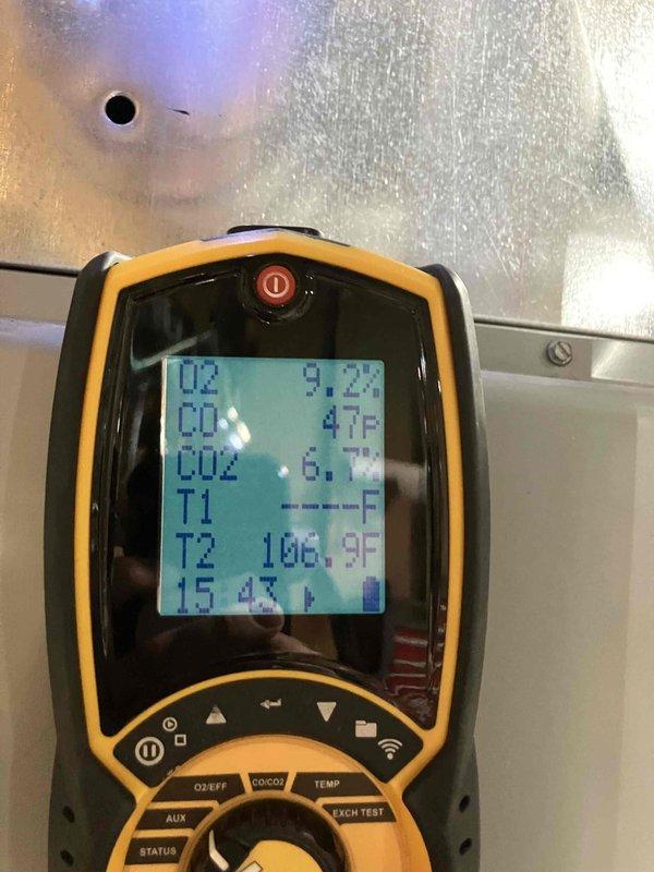 Completed annual furnace inspection and tune-up on gas heating system of unknown age. Performed combustion analysis using digital analyzer, measuring temperature differentials, CO levels, CO2 levels, and system efficiency readings. Inspected blower wheel assembly, noting dust and debris accumulation on fins and interior cabinet surfaces. Provided preventive maintenance recommendations and estimates for optimal system performance and longevity.