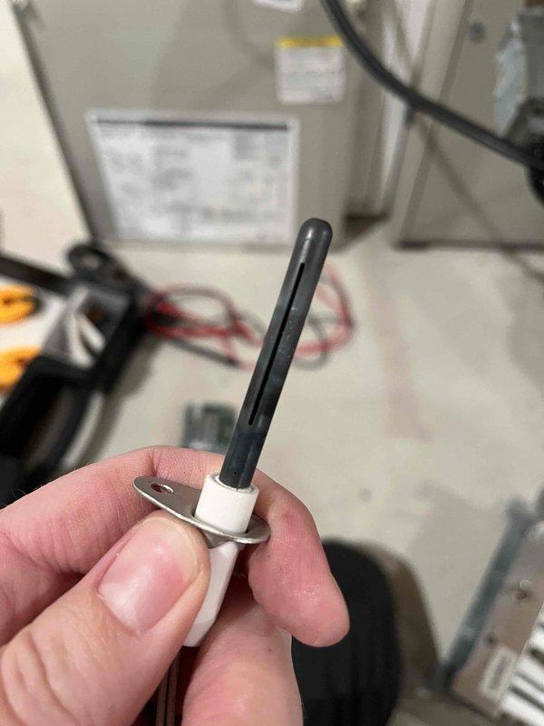 Responded to no heat call with flashing code indicating open pressure switch and limit switch issues. Upon inspection, found pressure switches failed for low fire operation, burners heavily corroded, compromised heat exchanger, and corroded flame sensor and igniter showing significant wear. Documented equipment condition with photos showing deteriorated burner assembly and failed flame sensor component, provided repair estimates, and coordinated with comfort advisor for replacement options.