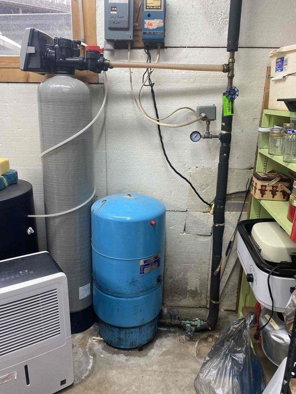 Completed prepaid annual maintenance on water heater, which was found to be in acceptable operating condition. Identified pressure tank system requiring replacement and provided estimates to customer for necessary work.