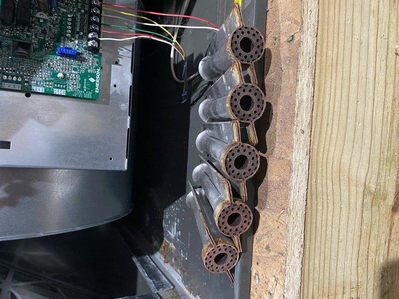 Responded to no-heat call on residential furnace system (2012 unit). Upon inspection, discovered heavily corroded burner assembly preventing proper ignition and heat production. Removed failed burners and installed new burner assembly, verified gas valve operation, tested all electrical connections and control board functionality. Cycled system through multiple heating cycles, confirmed proper ignition sequence, flame characteristics, and heat delivery to living space.