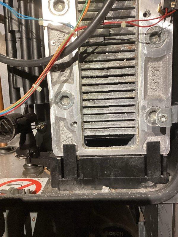 Completed preventive maintenance inspection on boiler system as part of annual prepaid maintenance agreement. Observed aging electrical components including control board with heat sink assembly showing operational wear and tested capacitor functionality using digital multimeter. Documented equipment condition with photographs and provided customer with repair options for aged components to prevent potential future failures.