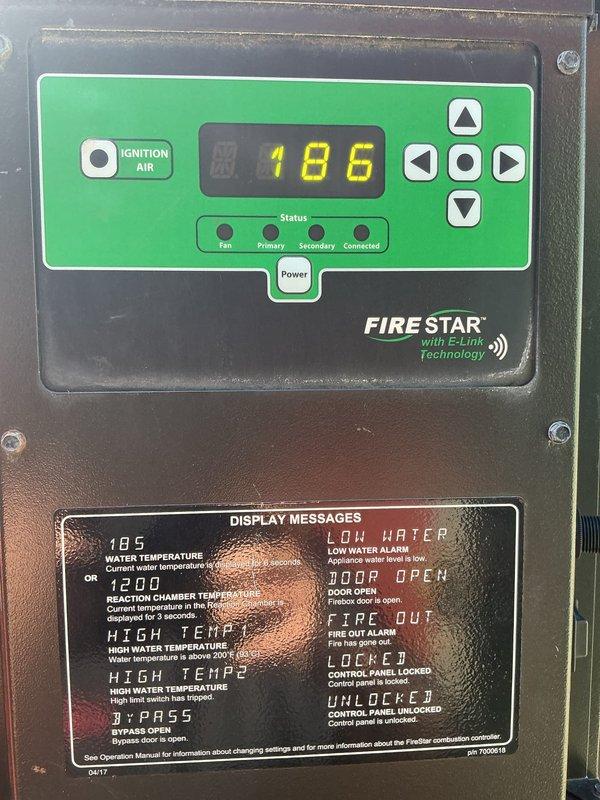 Completed annual maintenance inspection on 8-year-old LP furnace system with FIRESTAR E-Link Technology control panel. Installed new humidistat to replace existing unit for improved humidity control. Performed standard tune-up procedures including inspection of all system components, burner assembly, heat exchanger, venting, and safety controls. Verified proper operation of digital control panel displaying water temperature at 186°F and confirmed all status indicators functioning correctly. Inspected hydronic heating components including PEX piping connections and air handler installation. Documented system condition with photos and provided estimate for duct cleaning services as requested. All equipment operating within normal parameters upon completion.