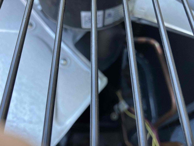 Completed annual prepaid maintenance on air conditioning system. Performed visual inspection of evaporator coil through access grille, noting moderate dust and dirt accumulation on heat exchanger fins requiring attention during next service interval. System operational at time of inspection.