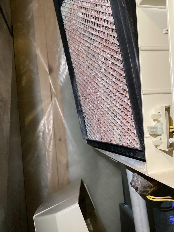 Completed annual furnace inspection and maintenance. Replaced air filter and Aprilaire humidifier pad as scheduled. System blower wheel showed dust accumulation but remains operational; customer enrolled in partner maintenance plan for ongoing service.