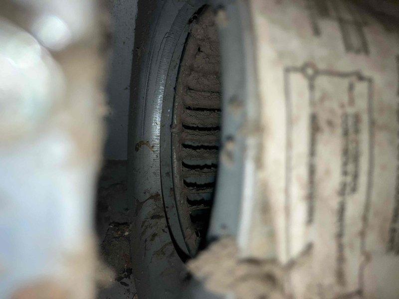 Performed annual inspection on 30-year-old Empire wall furnace that had never been serviced in 25 years of ownership. Found extensive rust and corrosion throughout the unit, including heavily deteriorated metal components and significant debris accumulation on the blower wheel assembly. Provided equipment replacement recommendations due to advanced age and deteriorated condition of the system.