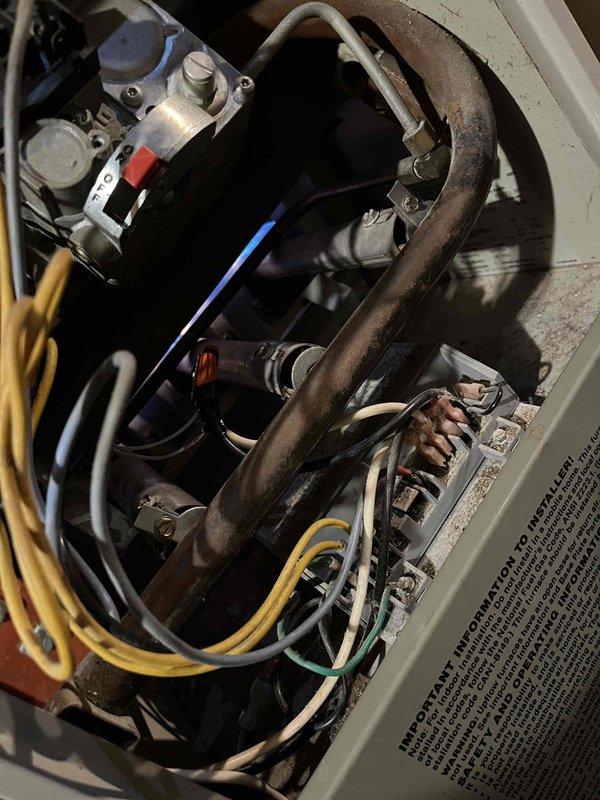 Completed annual heat inspection on boiler system as part of prepaid maintenance plan. Performed comprehensive evaluation of furnace components including burners, igniter, blower assembly, and ignition control system. Documented aging and wear on multiple critical components with photographic evidence showing internal mechanical systems, copper piping with significant patina, electrical wiring connections, and control panel assemblies. Provided estimates for necessary repairs and component replacements to maintain safe and efficient operation.