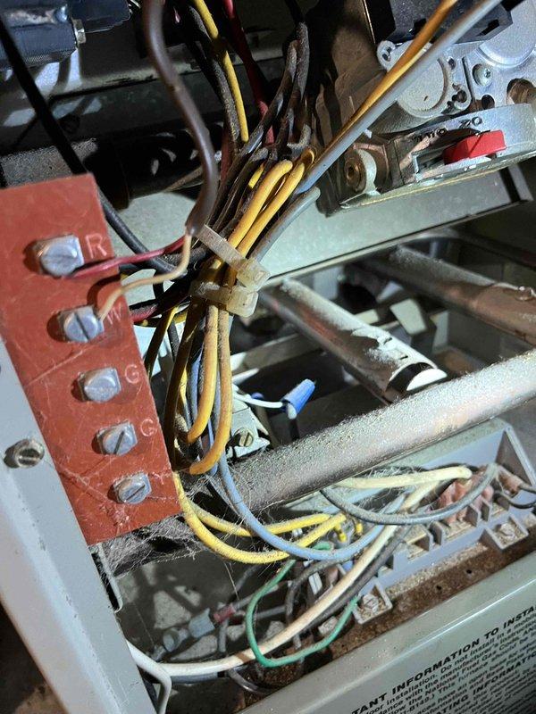 Completed annual heat inspection on boiler system as part of prepaid maintenance plan. Performed comprehensive evaluation of furnace components including burners, igniter, blower assembly, and ignition control system. Documented aging and wear on multiple critical components with photographic evidence showing internal mechanical systems, copper piping with significant patina, electrical wiring connections, and control panel assemblies. Provided estimates for necessary repairs and component replacements to maintain safe and efficient operation.