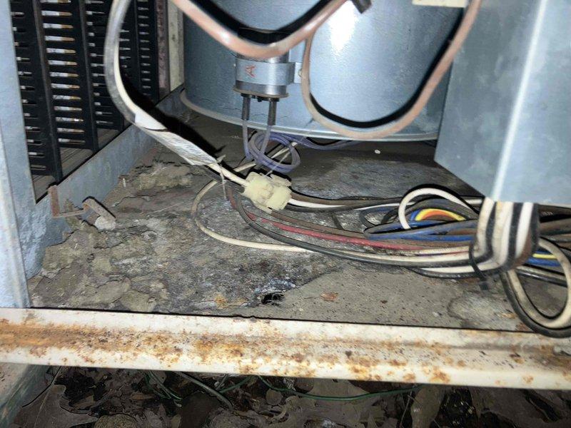 Responded to no heat call on Lennox furnace over 10 years old. Upon inspection, diagnosed failed gas valve and deteriorated burner assembly preventing ignition. Noted significant corrosion and rust on unit base and components, indicating age-related deterioration. Documented equipment condition with photos showing extensive dust accumulation, corroded metal surfaces, and worn electrical connections throughout cabinet. Provided customer with both preventive maintenance and immediate repair estimates for gas valve and burner replacement to restore heating operation.