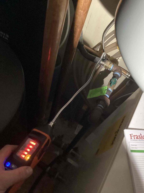 Responded to service call for reported exhaust odor and gas leak from boiler system located in mechanical room. Upon inspection, identified exhaust leak at boiler flue connection. Performed gas leak detection using digital combustible gas detector to pinpoint leak source at piping connections. Completed gas leak repair by tightening and resealing affected connections on copper gas supply lines and flexible connector assembly. Conducted thorough leak verification testing throughout entire gas piping system using calibrated detection equipment, confirming zero detectable leaks post-repair. System returned to safe operating condition with proper ventilation and no further exhaust odor present.