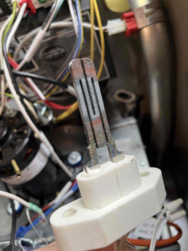 Completed partner plan annual inspection on boiler system. During inspection, identified corroded igniter requiring replacement and inducer motor capacitor reading below manufacturer specifications. Documented equipment condition with photos showing extent of igniter corrosion and capacitor details (Genteq 27L571S, 370VAC). Provided repair estimates to address both identified issues to ensure continued safe and efficient operation of heating system.