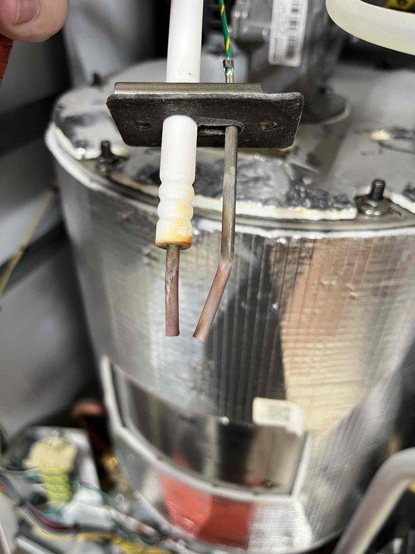 Responded to no heat and no hot water complaint. Inspected boiler and found heavily corroded igniter preventing proper ignition. Combustion analysis revealed off-spec levels indicating buildup in heat exchanger. Discussed options including heat exchanger cleaning versus full system replacement. Customer elected to proceed with system replacement estimates.