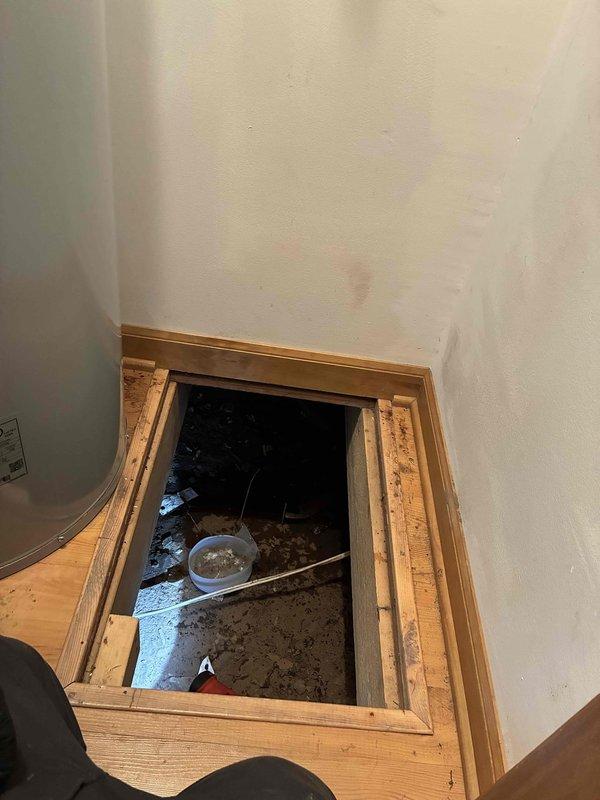 Performed seasonal cottage opening inspection for single-bathroom unit. Upon arrival, found all plumbing systems disconnected from winter winterization. Documented key access location and crawl space access point beneath floor for future reference. No immediate solutions implemented; assessment complete and awaiting further direction for system reconnection and startup procedures.