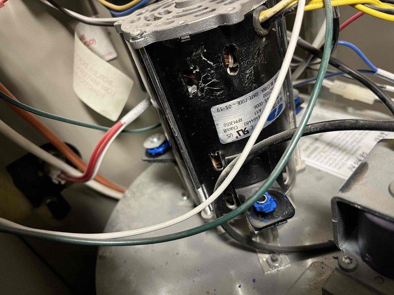Responded to service call for excessive noise during boiler operation with indirect water heater. Diagnosed failing blower motor bearings causing severe vibration that damaged mounting grommets and likely compromised the blower wheel integrity. Documented equipment condition with photos showing deteriorated motor assembly and damaged mounting components. Provided written estimates for repair options and recommended comfort advisor consultation for comprehensive system evaluation.