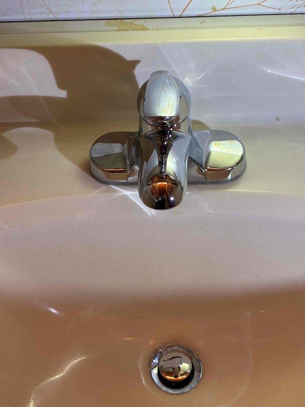 Completed cottage de-winterization service for two-bathroom property. Replaced leaky bathroom faucets with new chrome-finished single-handle units, restoring proper water flow and eliminating leaks in both locations.