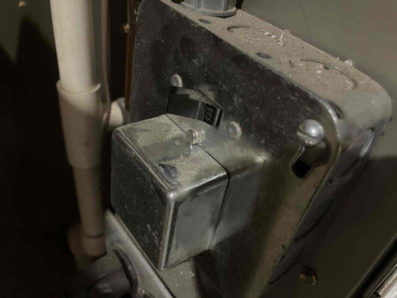 Responded to no heat call on 13-year-old furnace that was continuously running even when switched off. Upon inspection, discovered heat exchanger heavily sooted up, indicating incomplete combustion and potential safety hazard. Documented equipment condition with photographs showing accumulated dust and wear consistent with age of unit. Provided customer with options for heat exchanger replacement to restore proper heating function and ensure safe operation.