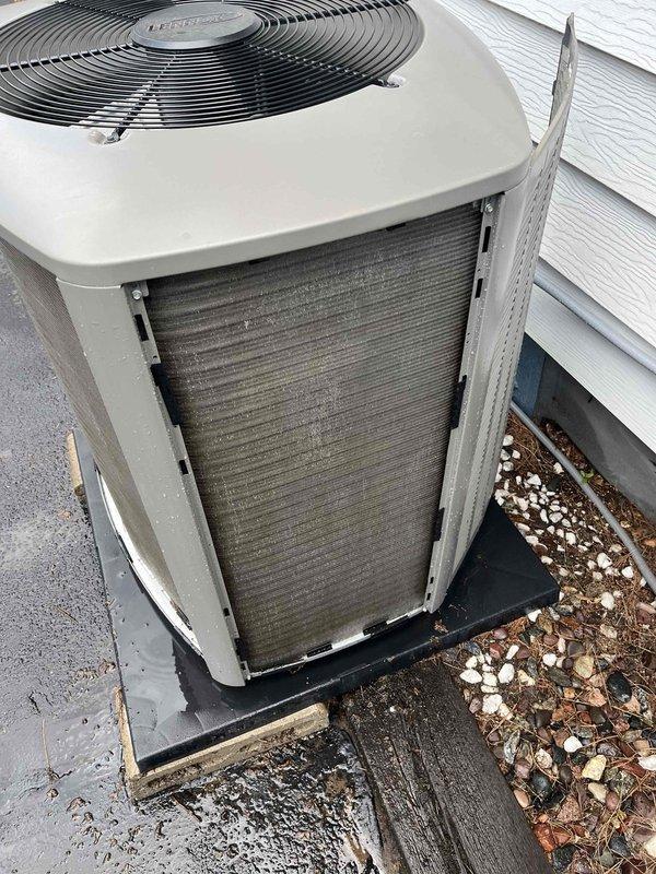 Completed annual partner plan inspection on air conditioning system. Condenser coils exhibited heavy accumulation of pollen, dust, and environmental debris affecting heat transfer efficiency. Thoroughly washed condenser fins to restore proper airflow and system performance.