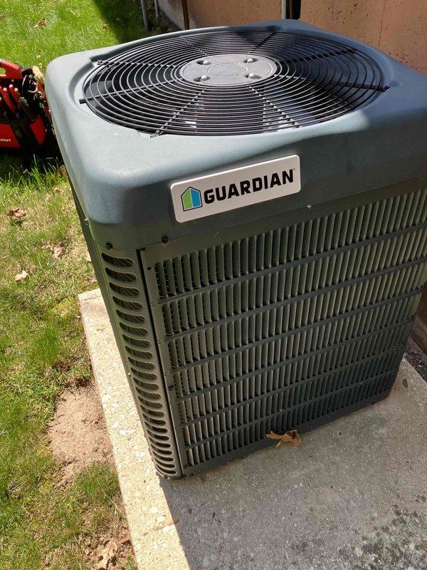 Responded to no cooling complaint on Guardian brand air conditioning system. Upon arrival, unit was operating normally with adequate airflow and cooling performance. Conducted thorough inspection of outdoor condenser unit and accessible components. Identified corroded capacitor with visible rust deterioration during electrical component examination. Unit currently functioning properly, but capacitor condition indicates potential future failure risk. Provided estimate for capacitor replacement to prevent system breakdown. Documented equipment condition with photographs showing outdoor condenser unit placement and internal component conditions including dust accumulation on ductwork.