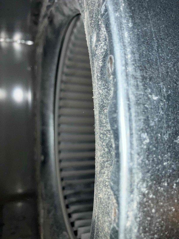 Responded to no cooling complaint on Guardian brand air conditioning system. Upon arrival, unit was operating normally with adequate airflow and cooling performance. Conducted thorough inspection of outdoor condenser unit and accessible components. Identified corroded capacitor with visible rust deterioration during electrical component examination. Unit currently functioning properly, but capacitor condition indicates potential future failure risk. Provided estimate for capacitor replacement to prevent system breakdown. Documented equipment condition with photographs showing outdoor condenser unit placement and internal component conditions including dust accumulation on ductwork.
