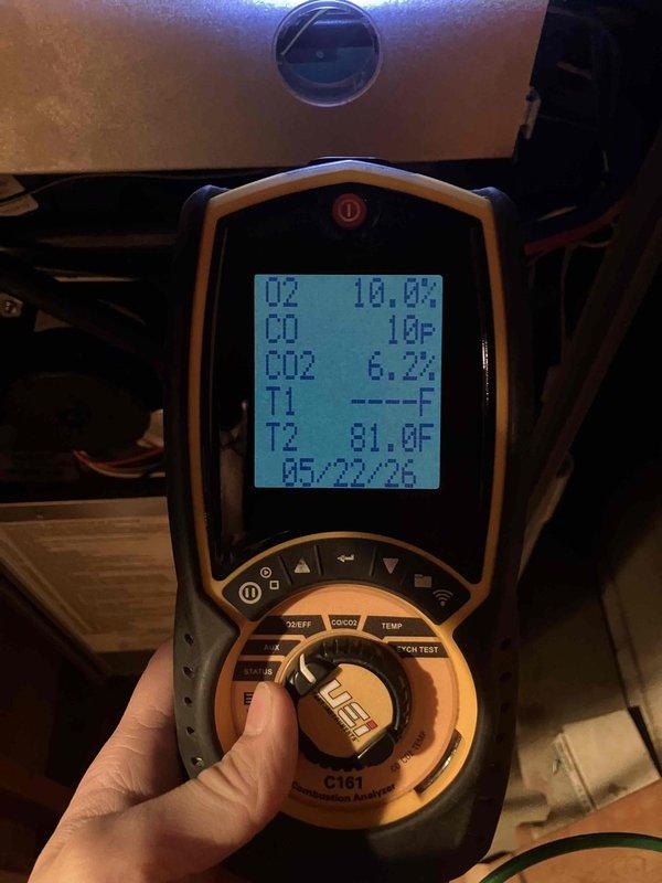 Completed annual prepaid preventative maintenance on furnace system. Performed comprehensive system inspection, tested combustion efficiency and safety parameters using diagnostic equipment with readings showing O2 at 10.0%, CO2 at 6.2%, and temperature at 81.0°F, verified proper airflow through ventilation components, and documented system condition with photos. All equipment operating within normal parameters with no issues found.