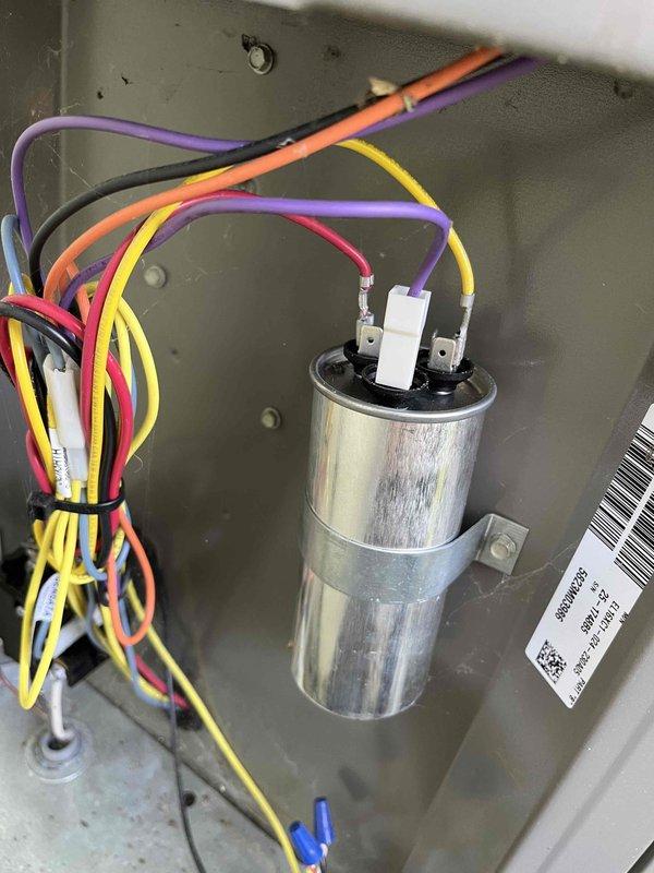 Completed annual Partner Plan inspection on air conditioning system. Condenser unit had accumulated pollen and debris on cooling coils, which was cleaned during inspection. Verified dual capacitor connections and electrical components are secure and functioning properly.