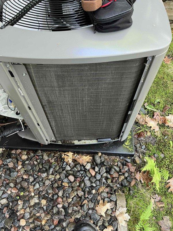 Completed annual Partner Plan inspection on air conditioning system. Condenser unit had accumulated pollen and debris on cooling coils, which was cleaned during inspection. Verified dual capacitor connections and electrical components are secure and functioning properly.