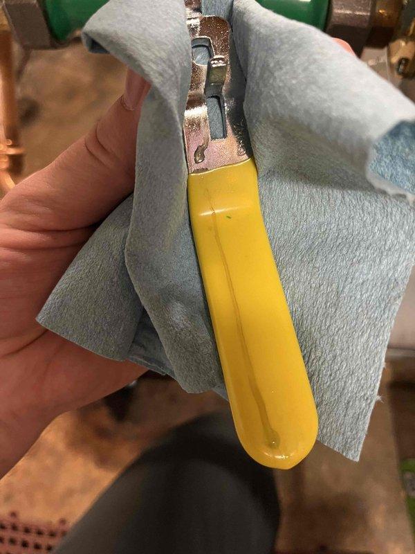 Responded to a boiler leak complaint and identified water seepage at the packing nuts of two ball valves in the system piping. Tightened both packing nuts to proper specification, cleaned up accumulated water from the affected area, and monitored the system to confirm leak resolution with no further seepage observed.