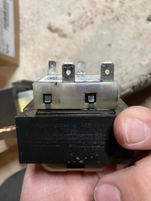 Responded to no cooling complaint affecting entire home. Upon arrival, diagnosed failed transformer and discovered AC condenser breaker in off position. Reset breaker to on position and replaced defective transformer under warranty coverage. System restored to normal operation with proper heating and cooling functionality throughout residence.