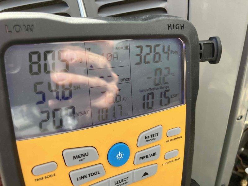 Responded to no cooling complaint on commercial HVAC unit. Performed diagnostic evaluation and confirmed low refrigerant charge through pressure testing. Inspected blower assembly and found moisture accumulation on blower wheel, indicating system had been operating under abnormal conditions. Provided estimate for complete leak check procedure and refrigerant recharge to restore proper system operation.