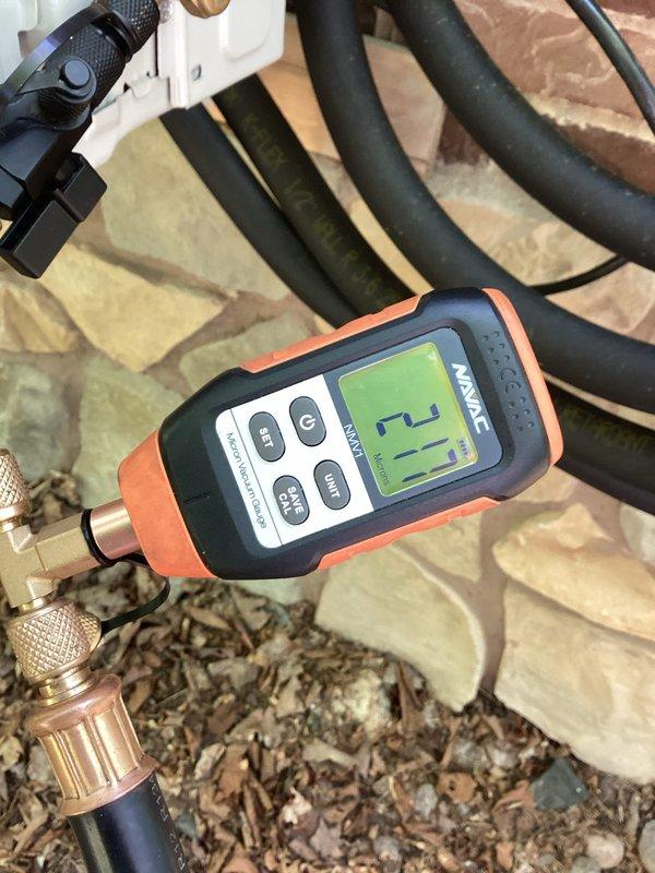 Performed evacuation, leak test, and vacuum procedure on newly installed ACiq 12,000 BTU mini split system. Connected manifold gauges and micron gauge to refrigerant lines, achieved proper vacuum levels, and verified system integrity with no leaks detected. System tested and operational per manufacturer specifications.