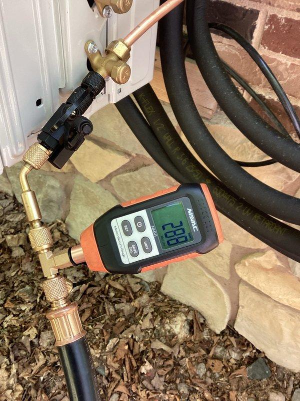Performed evacuation, leak test, and vacuum procedure on newly installed ACiq 12,000 BTU mini split system. Connected manifold gauges and micron gauge to refrigerant lines, achieved proper vacuum levels, and verified system integrity with no leaks detected. System tested and operational per manufacturer specifications.