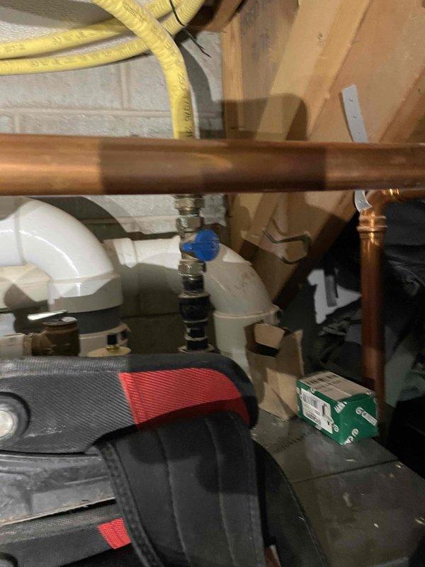 Responded to no heat call for high efficiency modulating condensing boiler over 10 years old. Upon inspection, found active leak on copper piping with visible corrosion and deterioration of pipe fittings. System was non-operational due to leaking component compromising boiler function. Documented conditions with photos showing affected piping, valve assembly, and boiler control panel. Provided repair/replace recommendation to restore heating system operation.
