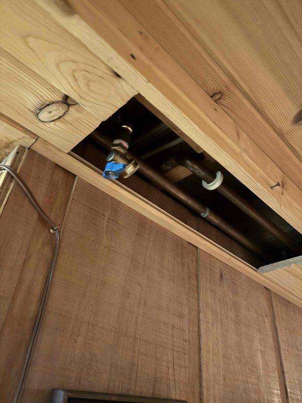 Completed de-winterization service for second bathroom by restoring water supply to the system. Reconnected Fernco coupling at plumbing access point, activated main water supply, and performed comprehensive leak inspection of all connections and fixtures with no issues identified.