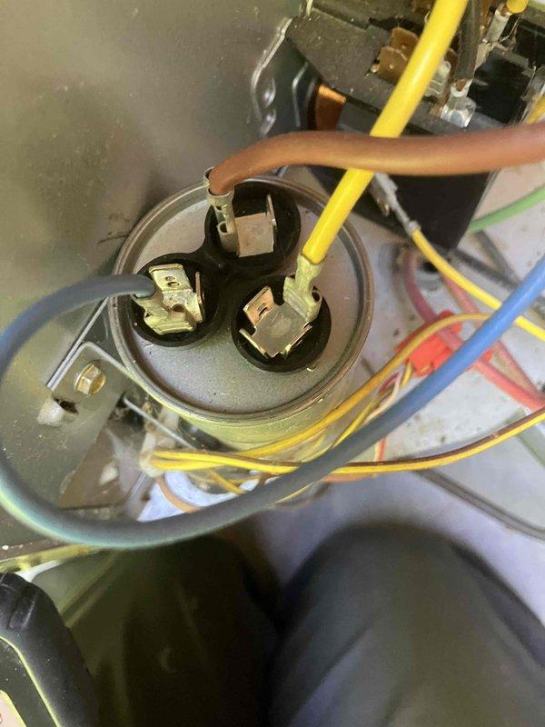 Completed prepaid annual maintenance on air conditioning system. Performed comprehensive inspection of all components including blower wheel assembly and electrical connections. Verified capacitor connections and terminals are secure with proper wire terminations. Blower wheel shows normal operational wear with minor dust accumulation. All electrical components functioning within normal parameters. System operational and ready for cooling season.