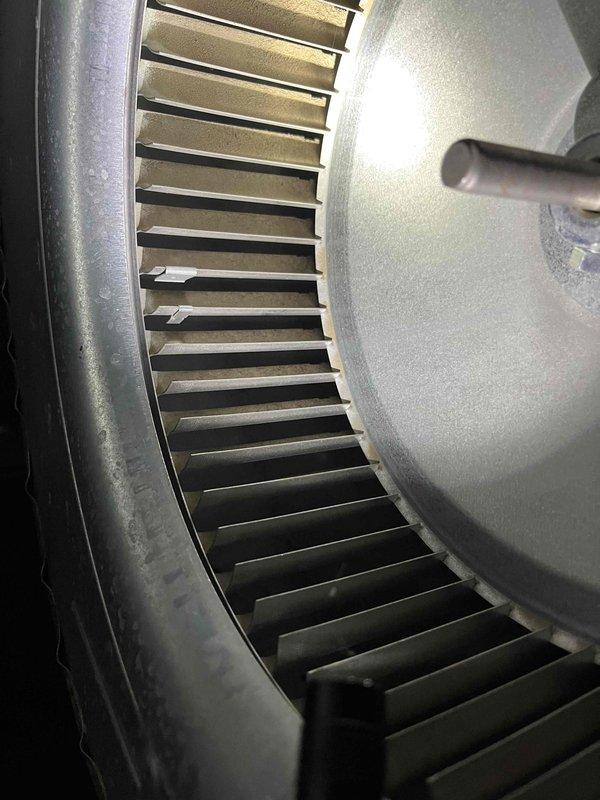 Completed annual partner plan inspection on furnace system. During inspection, identified blower run capacitor reading below acceptable specifications and noted moderate dust and debris buildup on blower wheel assembly affecting system efficiency. Documented conditions with photographs of heat exchanger ports showing dust accumulation and blower wheel with visible contamination on blades. Provided estimates for capacitor replacement and blower wheel cleaning to restore optimal system performance.