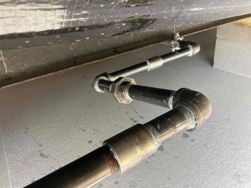 Provided estimate for gas piping installation requiring hard pipe run from interior to exterior of residence. Assessed crawl space access and existing foundation structure to determine routing for new gas line. Customer requested scheduling for installation following home setup completion.