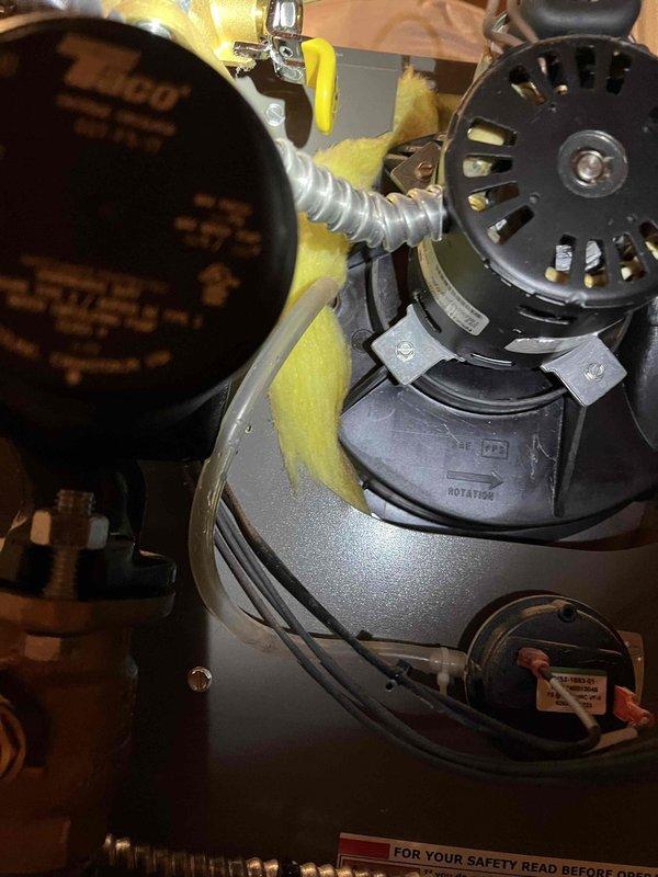Responded to leak at recently installed boiler located at circulating pump area. Upon inspection, identified leaking packing nuts on the circulating pump flange valves. Tightened packing nuts on both flange valves and monitored system operation to verify repair. Confirmed no further leakage present and system operating properly.