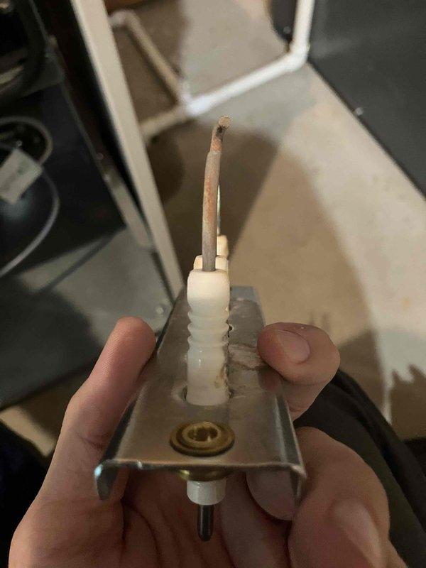 Completed annual heat inspection on furnace as part of prepaid maintenance plan. Identified leaking pressure relief valve on water heater and documented condition with photos showing corroded flame sensor assembly and igniter component with visible buildup. Provided estimates for necessary repairs to address the leaking relief valve.