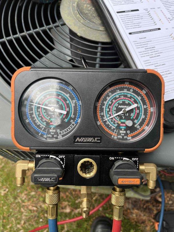Completed annual partner plan inspection on air conditioning system. Performed comprehensive system evaluation including pressure readings, electrical component inspection, and operational testing. All components including capacitor and fan motor were functioning properly. Provided thermostat operation instruction to customer. System is aged but operating within normal parameters at this time.