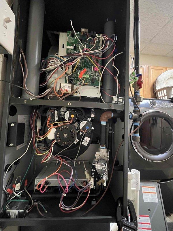 Responded to callback for furnace running continuously and not responding to thermostat commands, with reported burning rubber odor. Upon inspection, could not replicate the issue of unit running when thermostat was set to off position. Removed access panel and performed diagnostic testing on internal components. Isolated problem to either thermostat or integrated furnace control board. Provided customer with estimates for both thermostat replacement and control board replacement (Goodman Two-Stage HSI Integrated Furnace Control, White Rodgers model 50C51-707). Customer elected to proceed with thermostat replacement to resolve intermittent operation issue.