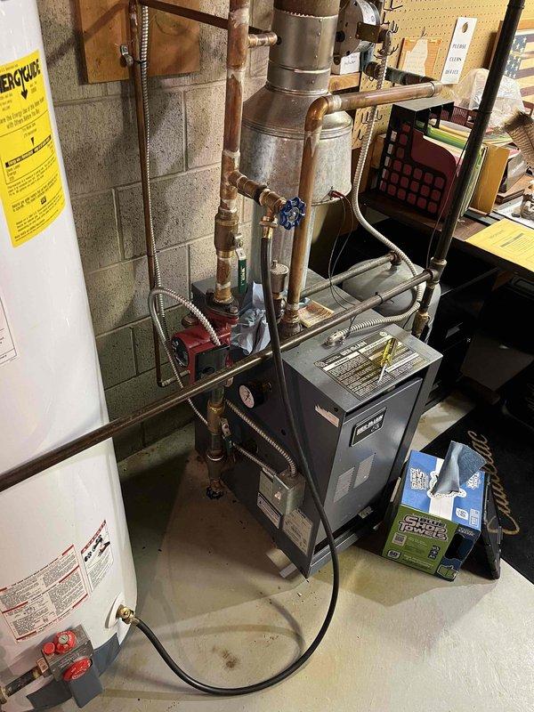 Responded to no heat call on residential boiler system where all heating zones were inoperative. Upon inspection, discovered circulation pump had burned out due to leak on main zone valve body. Removed and replaced failed zone valve assembly and circulation pump. Repressurized heating system to proper operating levels and completed full air purge procedure to restore functionality to all zones.