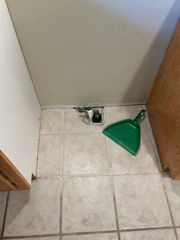 Installed new gas line to supply appliance per approved estimate. Ran black flexible gas pipe through basement/crawl space with proper fittings and shut-off valve, terminating at interior location with chrome gas valve assembly at floor level. All connections secured with appropriate compression fittings and tested for safe operation.