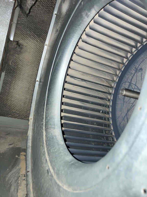 Completed prepaid annual maintenance on furnace system. Found dirty blower wheel with significant dust accumulation, wear on ignitor, burners, and inducer motor requiring monitoring. Performed combustion analysis with readings showing O2 at 6.6%, CO at 15 ppm, and CO2 at 8.2%. Documented blower assembly condition and provided estimate for duct cleaning services.