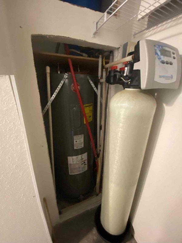 Completed annual inspection on water conditioning system. Found low calcite levels in the neutralizer tank and identified a leak in the head assembly. Replenished calcite media and replaced the complete stack assembly to resolve the leak. System tested and operating properly upon completion.