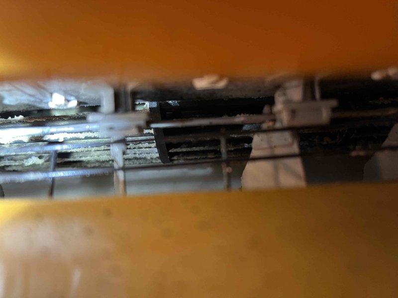 Performed annual inspection and maintenance on 15+ year old mini-split system. Found heavily soiled air filter and significant debris accumulation on fan assembly. Removed and cleaned filter, performed thorough cleaning of indoor unit fan components, and washed outdoor condenser coils. Provided estimate for comprehensive deep cleaning service to address remaining buildup in system components.