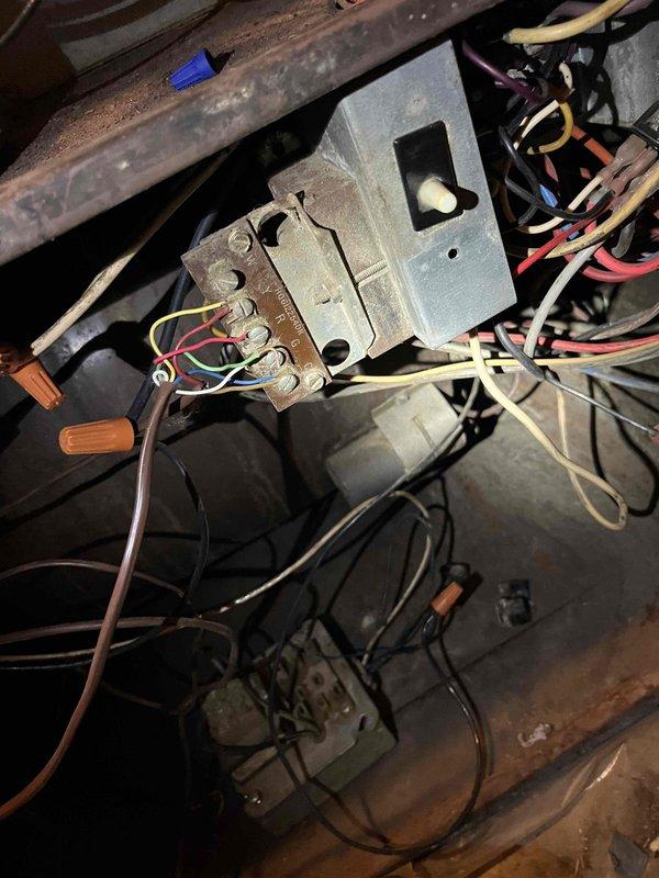 Responded to no cooling call on five-year-old air conditioning system. Diagnosed thermostat fan signal failure preventing system operation. Inspected control wiring at junction box in attic space and traced electrical connections to HVAC equipment in basement utility area. Provided estimate for thermostat replacement and necessary wiring repairs to restore proper system function.