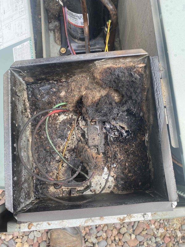 Responded to no cooling call on 18-year-old Rheem Classic air conditioning unit. Upon arrival, confirmed blower motor was operating but compressor failed to start. Diagnostic testing identified failed dual run capacitor and defective contactor as root cause of compressor failure. Replaced both capacitor and contactor with appropriate rated components. Verified proper electrical connections, tested system operation, and confirmed compressor startup and normal cooling cycle restoration. Unit returned to full operational status.