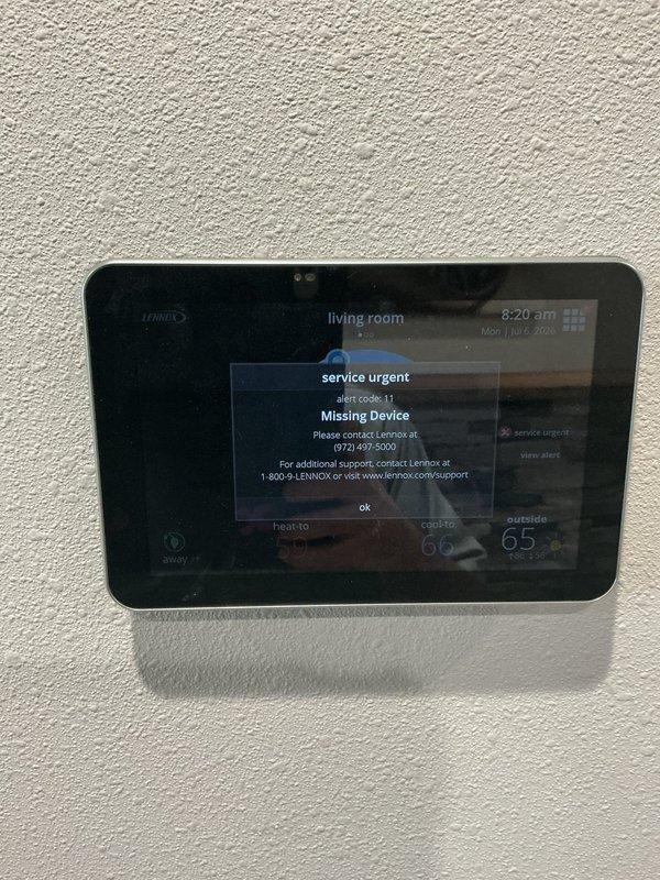 Responded to service call for Lennox communicating system displaying "Missing Device" error code on smart thermostat. Upon arrival, confirmed 6-year-old furnace had heating capability but no cooling function, with damper communication fault present. Diagnosed issue as lost communication between main HVAC control board and zone damper actuator. Verified thermostat was receiving service urgent notifications dating back multiple days, indicating persistent device connectivity failure. Documented system error codes and notification history via photos of control interface. Troubleshot communicating system network to isolate faulty component preventing proper zone control operation.